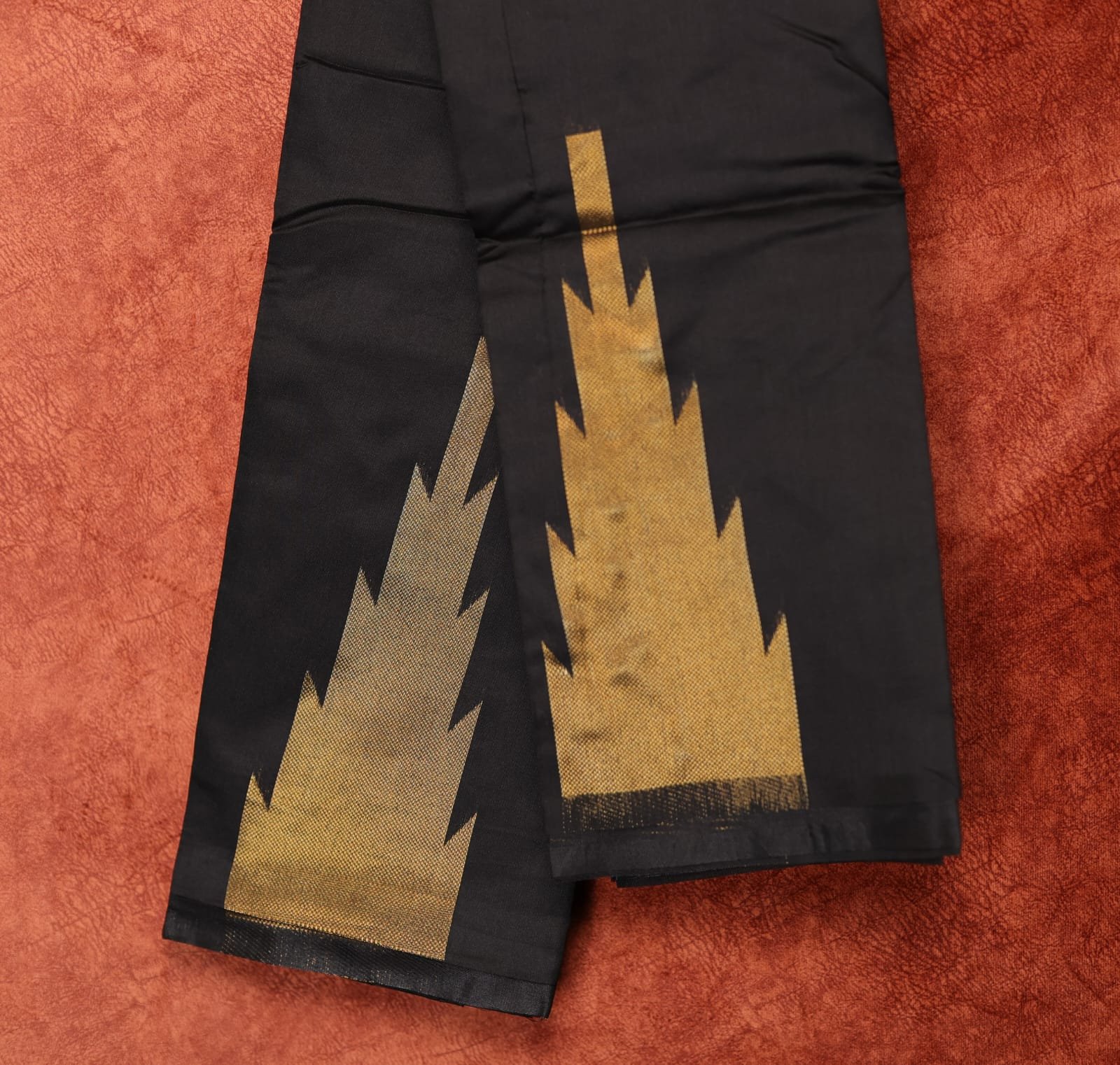 10 Black Saree with Bold Golden Zari Temple Border Design - Image 1