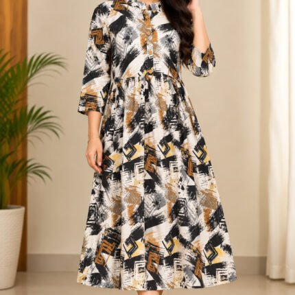 Woman wearing black, mustard and cream abstract printed flared midi dress with three-quarter sleeves.