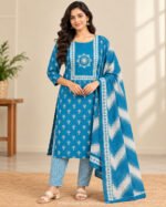 Woman wearing royal blue printed churidar set with white geometric pants and matching dupatta – Naayika Online