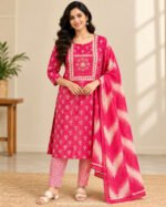 Woman wearing Rani Pink floral printed churidar with geometric pants and matching printed dupatta – Naayika Online