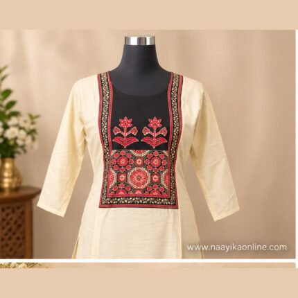 Cream kurta set with black floral yoke, matching cream bottom and black traditional printed dupatta.